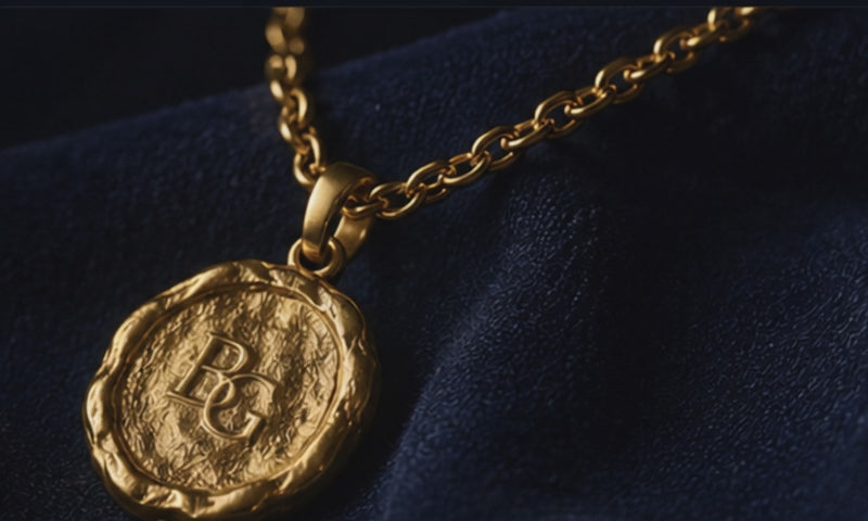 The BG Medallion in solid 24k gold, turning in the light